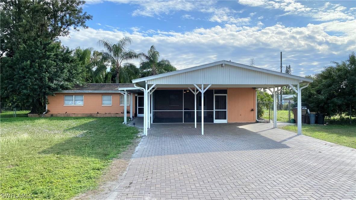 210 Canal Ct., Lehigh Acres, FL 33936