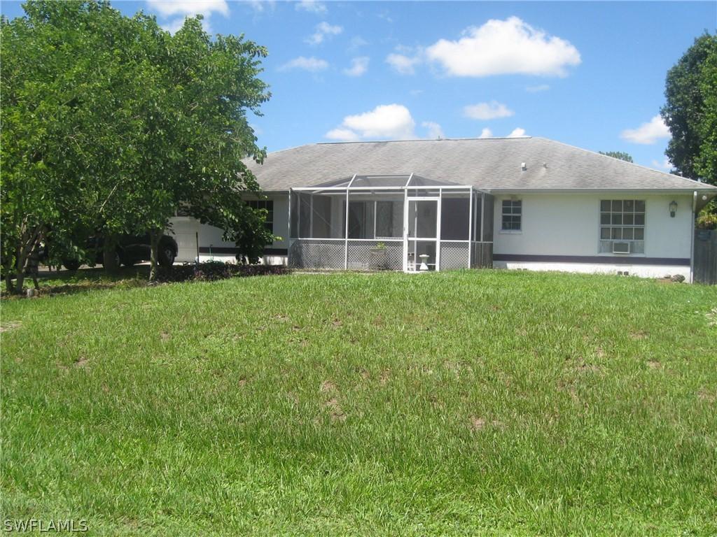 517 Plumosa Ave., Lehigh Acres, FL 33972