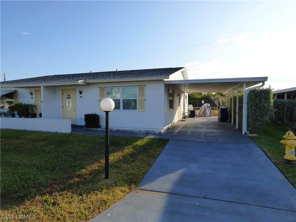 34 Heath Aster Ln., Lehigh Acres, FL 33936