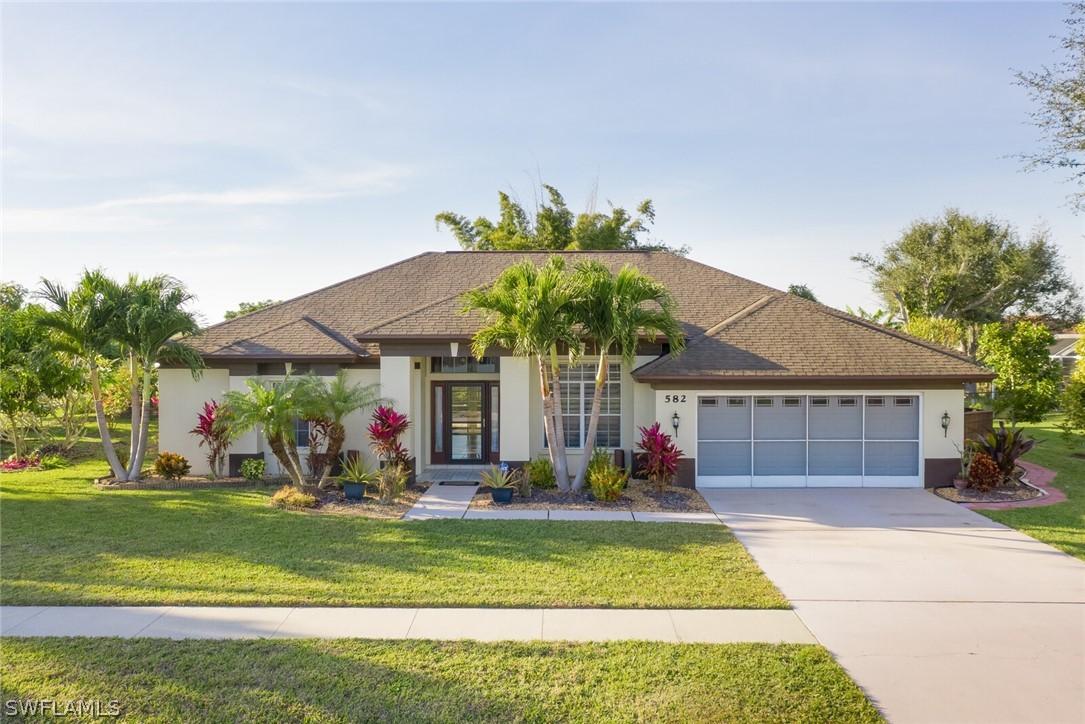 582 Chamonix Ave., Lehigh Acres, FL 33974