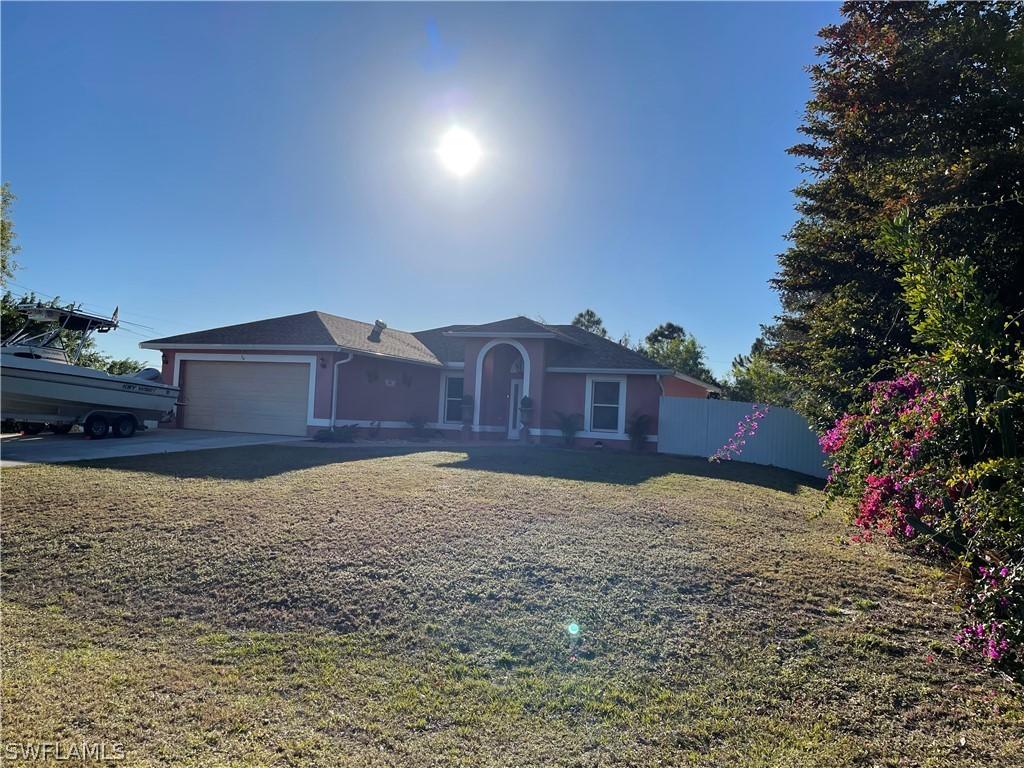 56 Alan Ave., Lehigh Acres, FL 33976