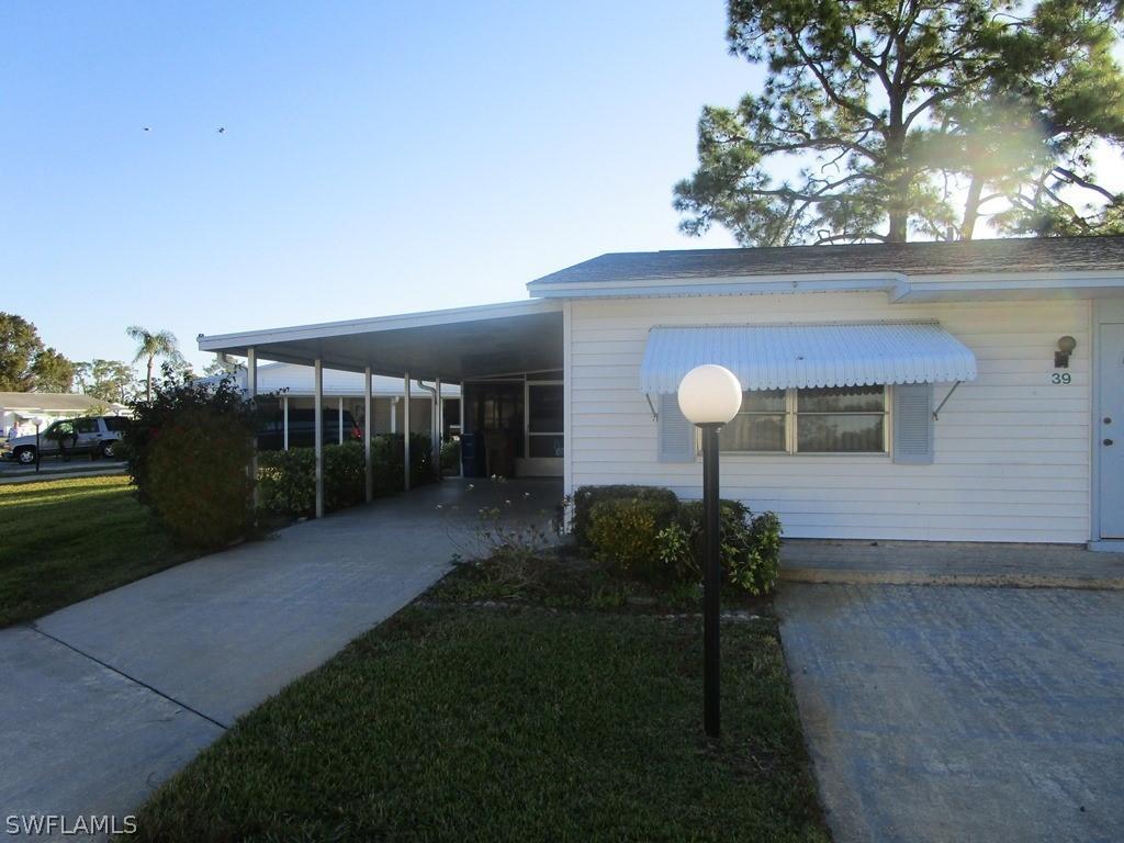39 Dawn Flower Cir., Lehigh Acres, FL 33936