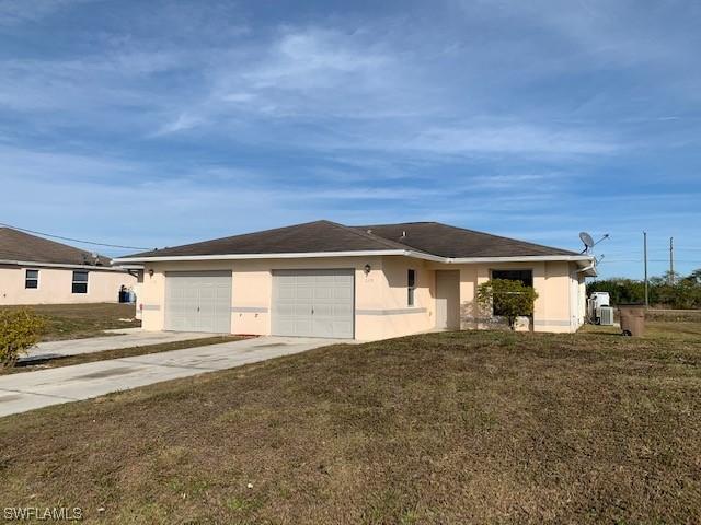 2609 Gilbert Ave., Lehigh Acres, FL 33973
