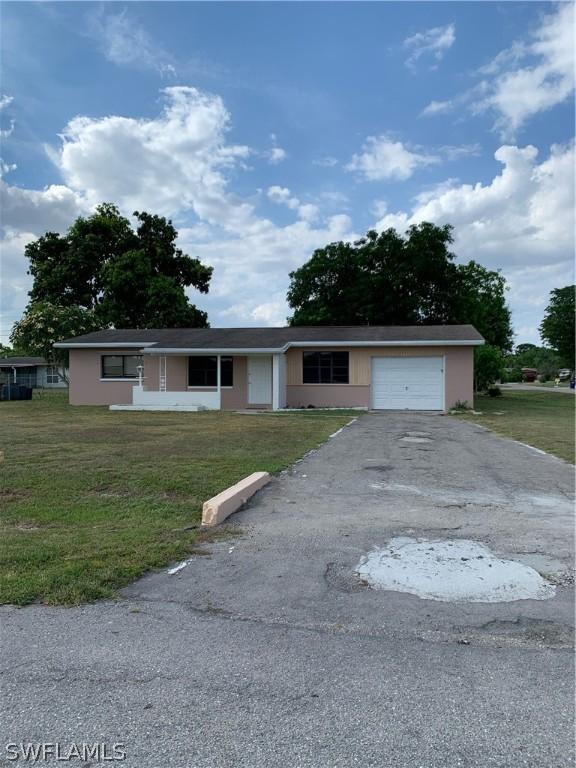 409 E Bougainvillea Rd., Lehigh Acres, FL 33936