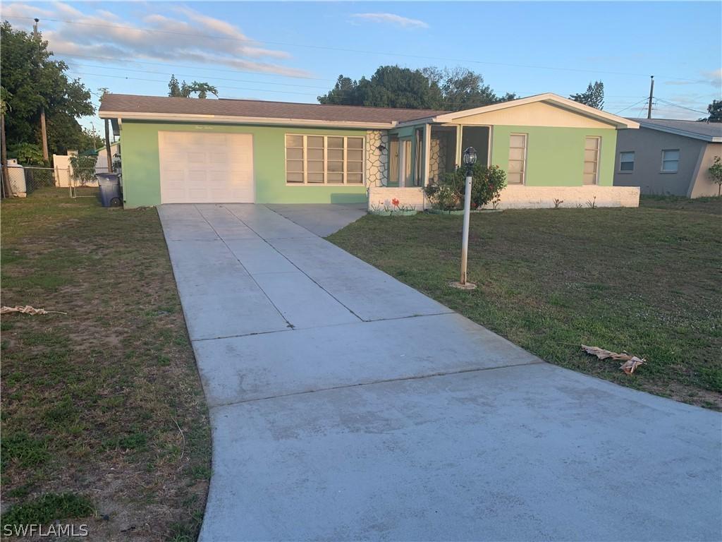 312 Morgan Cir., Lehigh Acres, FL 33936