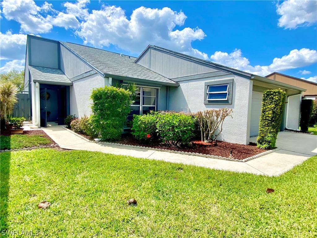 9785 Oakcrest Ct., Lehigh Acres, FL 33936