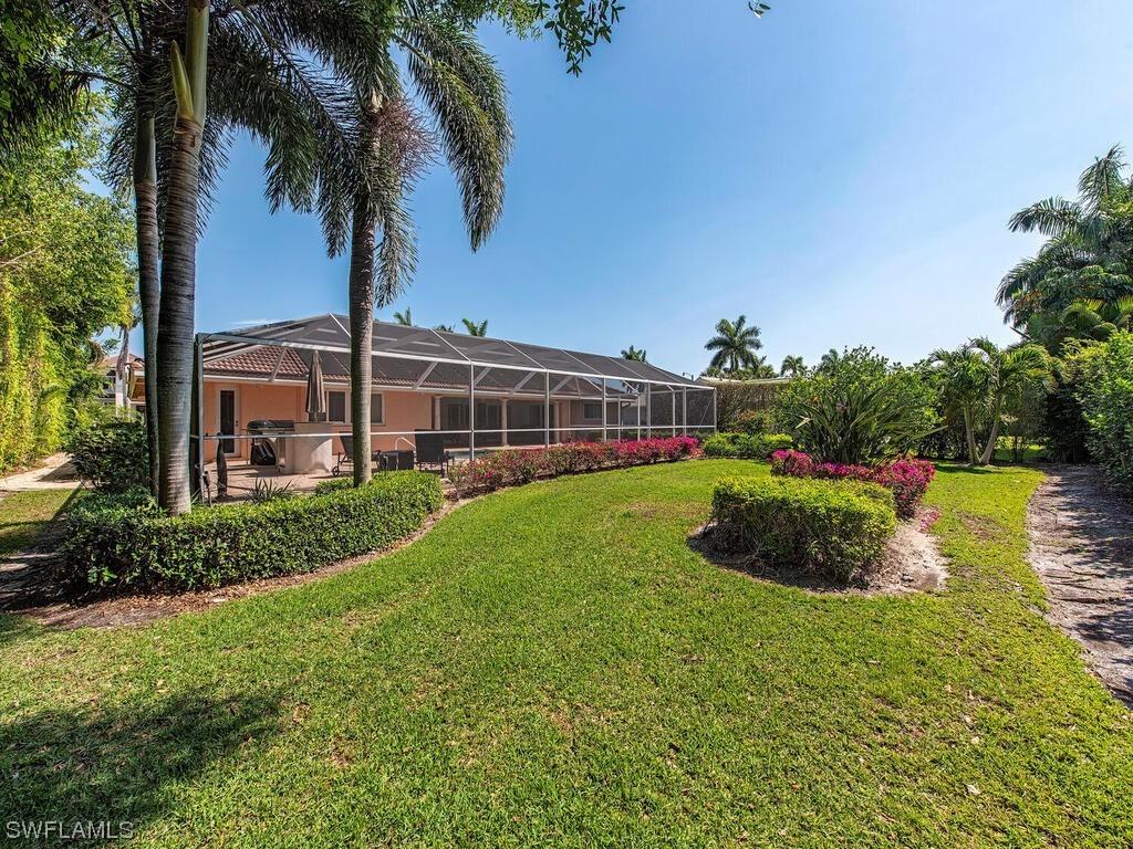 560 Neapolitan Way, Naples, FL 34103