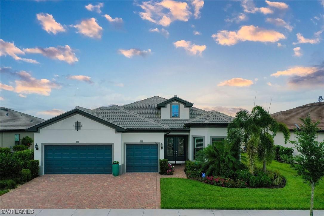 7663 Winding Cypress Dr., Naples, FL 34114