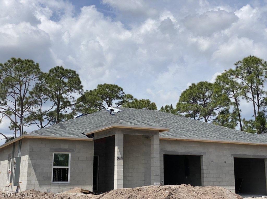 113/115 Harry Ave., Lehigh Acres, FL 33973