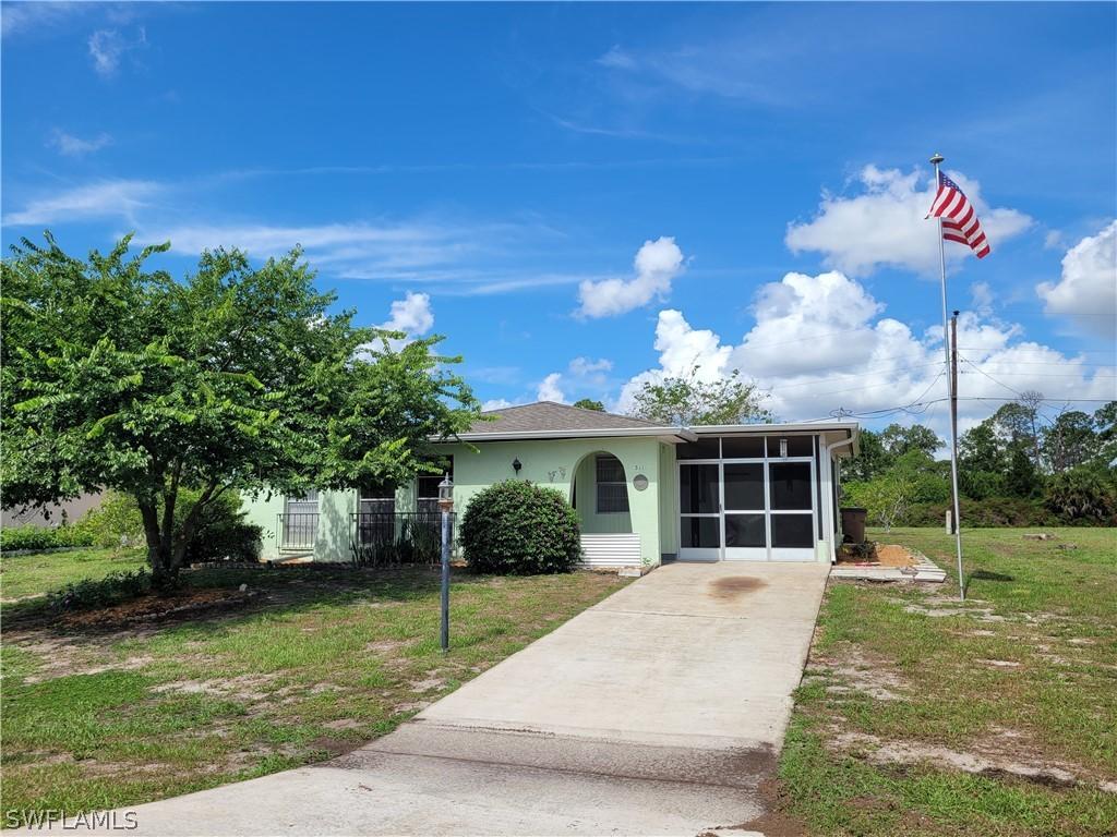311 Rushmore Ave., Lehigh Acres, FL 33936