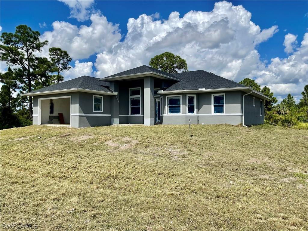 1143 Corry St., Lehigh Acres, FL 33974