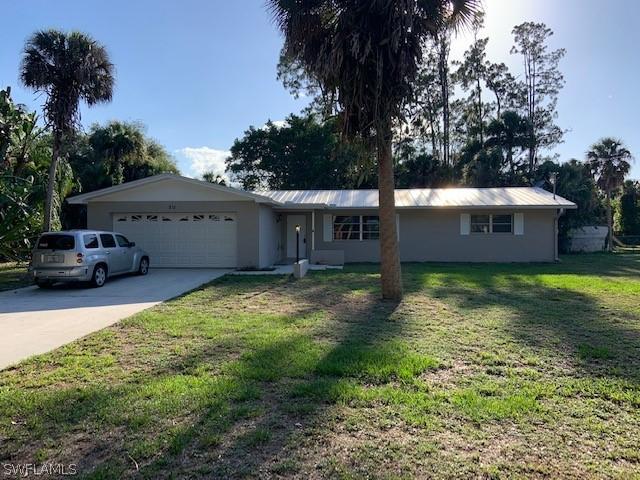 211 Lake Ave., Lehigh Acres, FL 33936