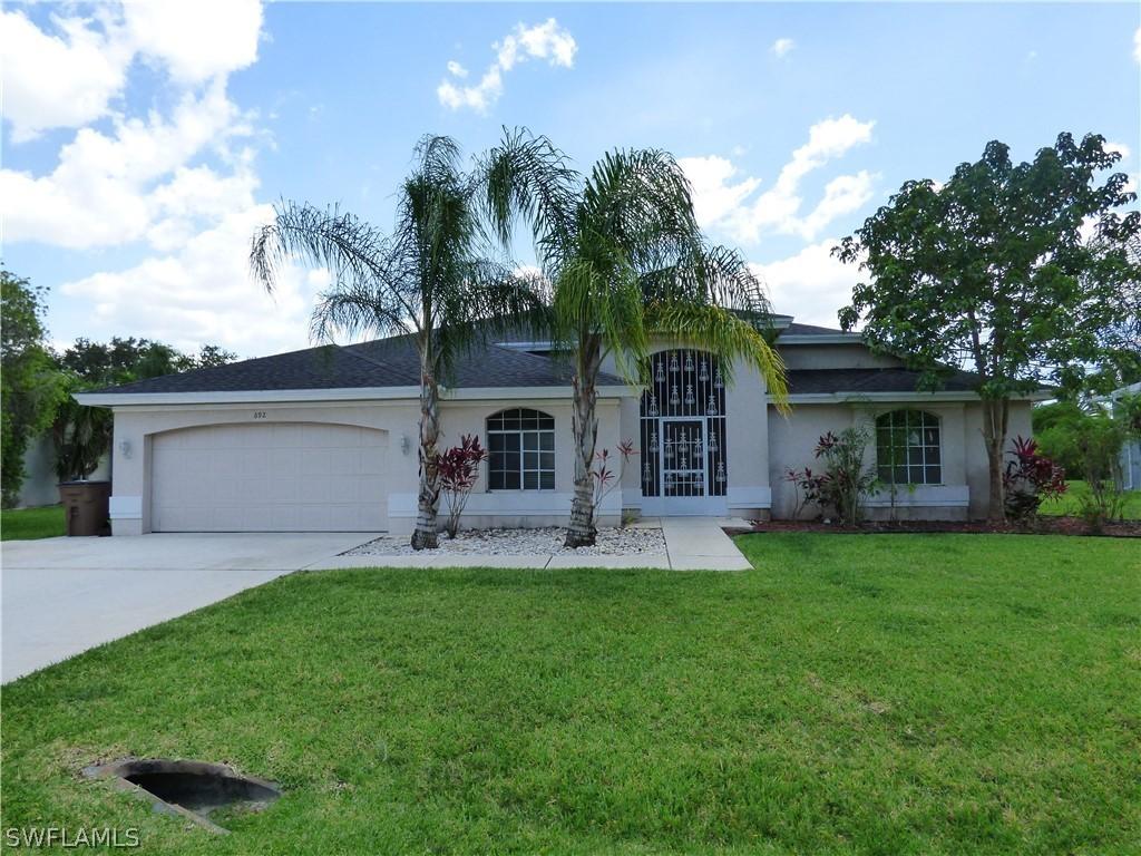 692 Covey Ln., Lehigh Acres, FL 33974