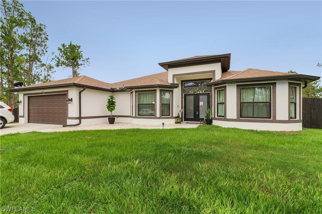 703 Truman Ave., Lehigh Acres, FL 33972