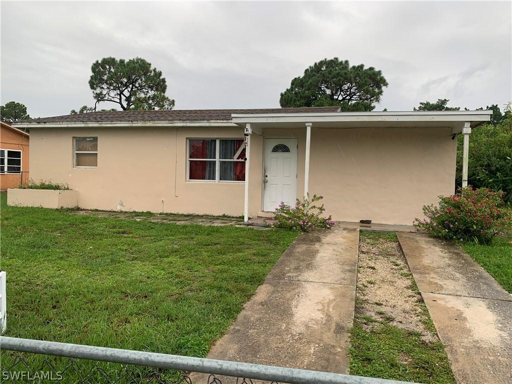 414 Morgan Cir., Lehigh Acres, FL 33936