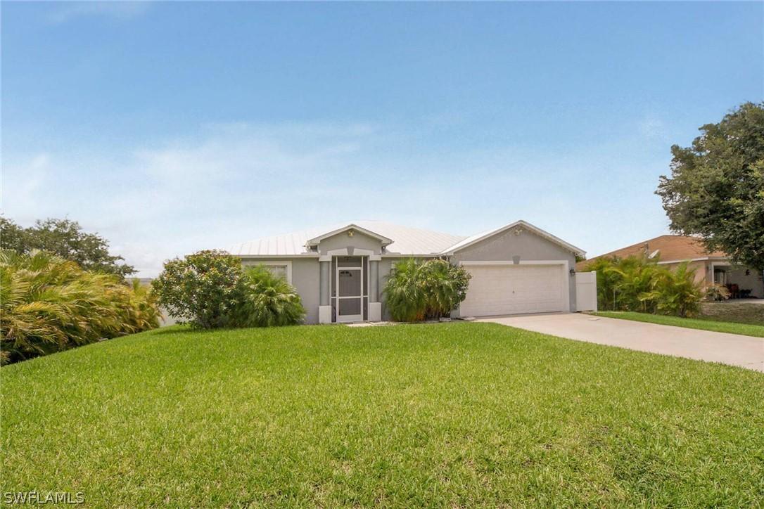 815 Champion Ave., Lehigh Acres, FL 33971