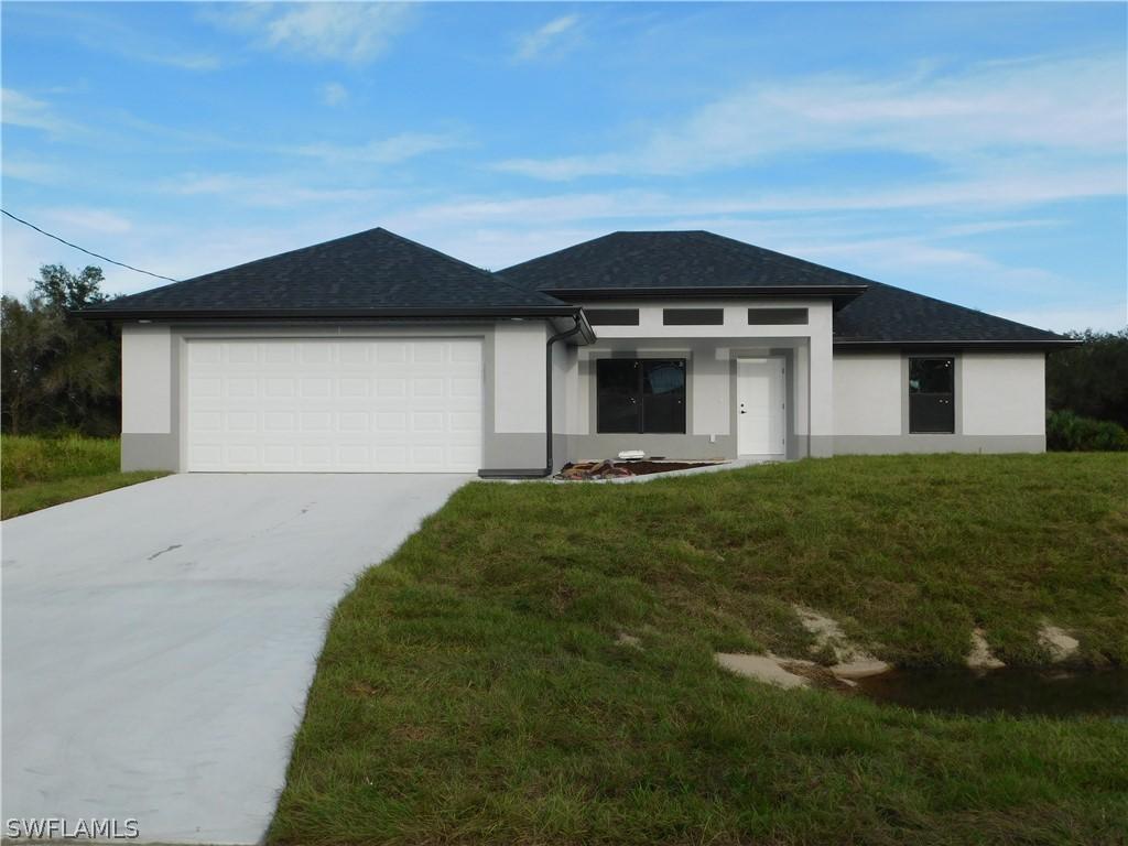 1205 Poinsettia Ave., Lehigh Acres, FL 33972
