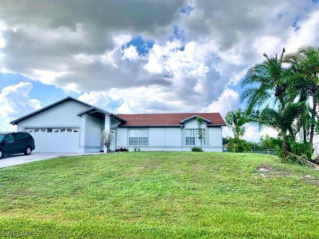 1124 Gretchen Ave., Lehigh Acres, FL 33973