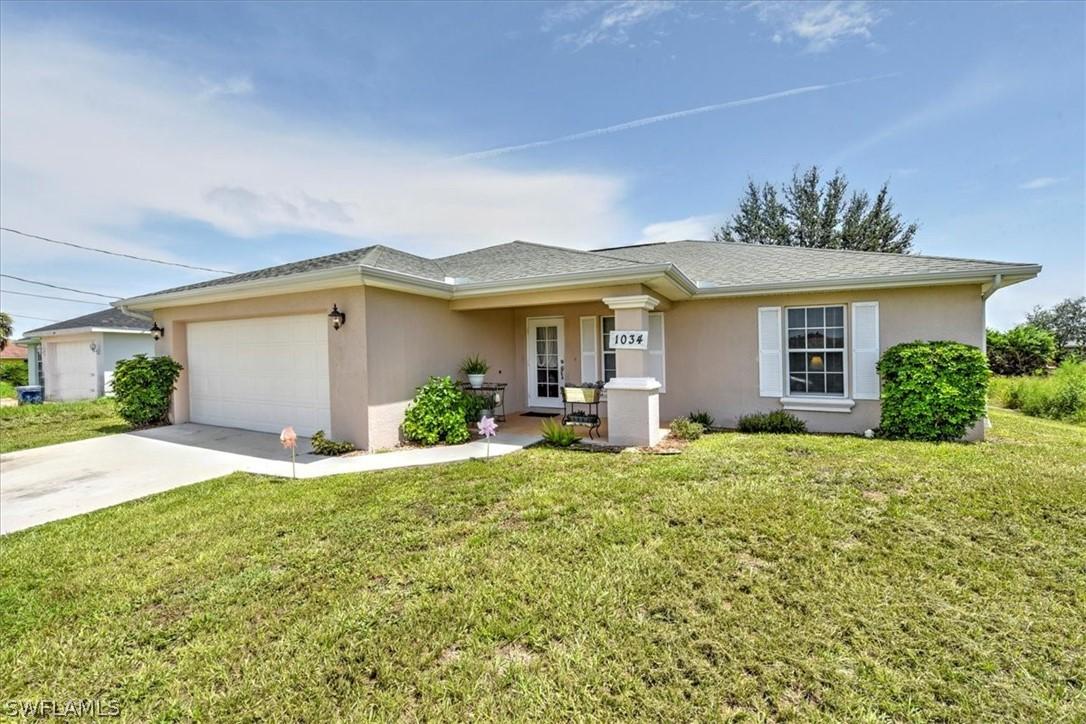 1034 Champion Ave., Lehigh Acres, FL 33971