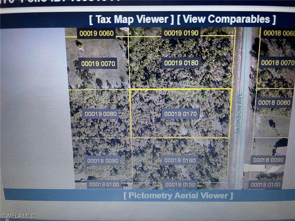 909 Jackson Ave., Lehigh Acres, FL 33972