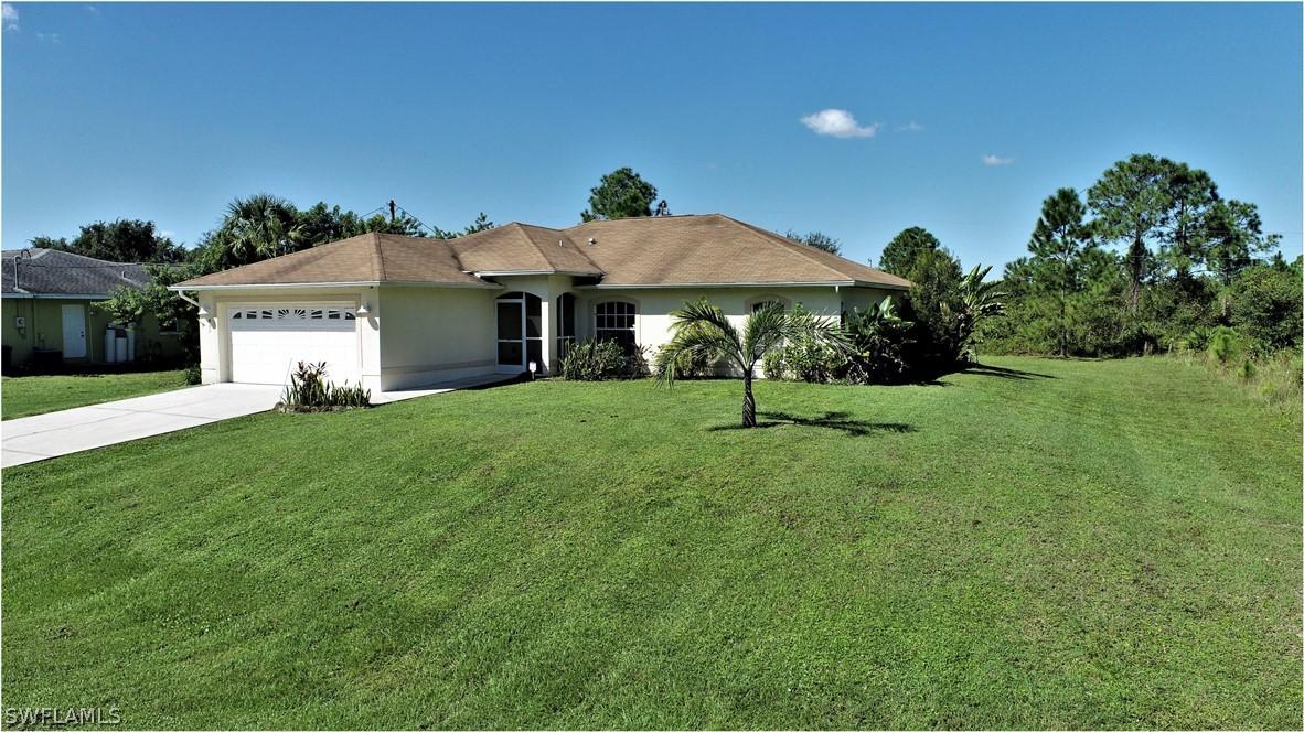 911 Mckinley Ave., Lehigh Acres, FL 33972