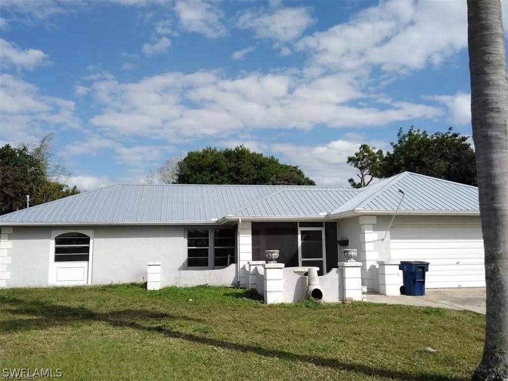 306 Lincoln Ave., Lehigh Acres, FL 33936