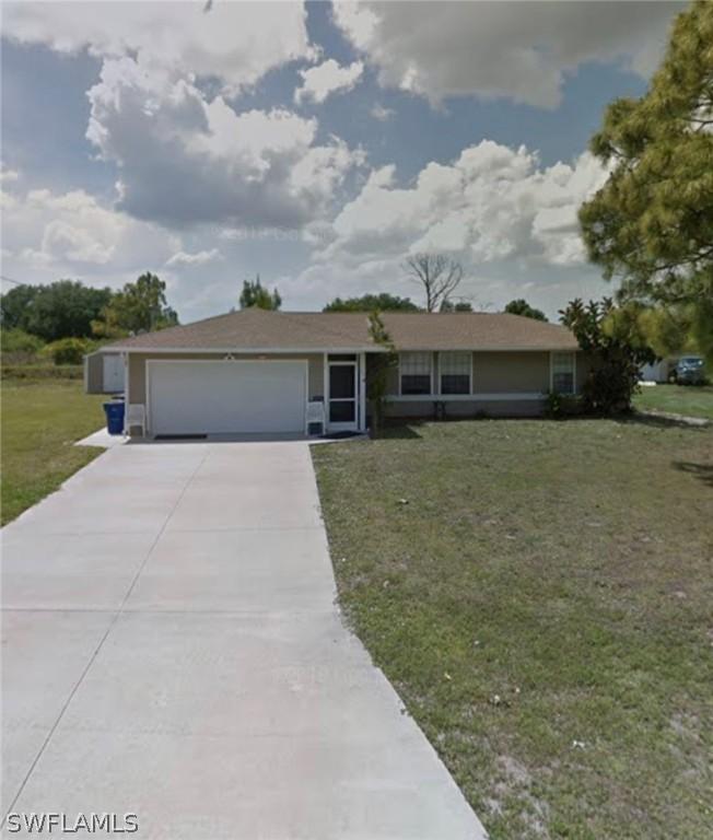447 Candlewick Cir., Lehigh Acres, FL 33936