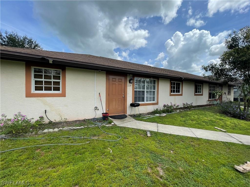117/119 Homer Ave., Lehigh Acres, FL 33973