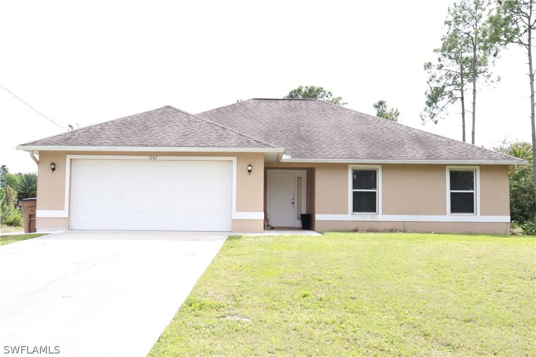1242 Summa Blvd., Lehigh Acres, FL 33974
