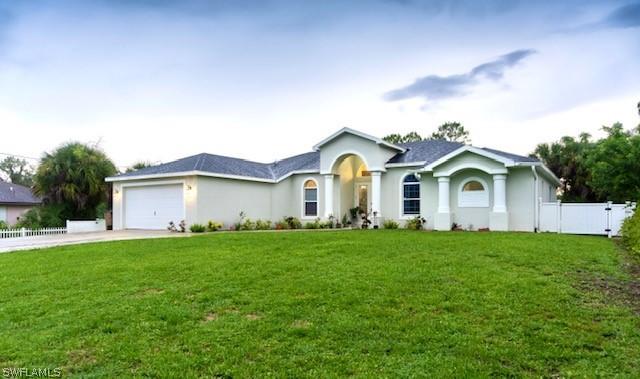 411 Cortez Ave., Lehigh Acres, FL 33972