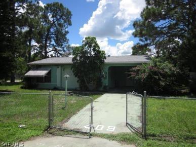 409 Cactus Cir., Lehigh Acres, FL 33936