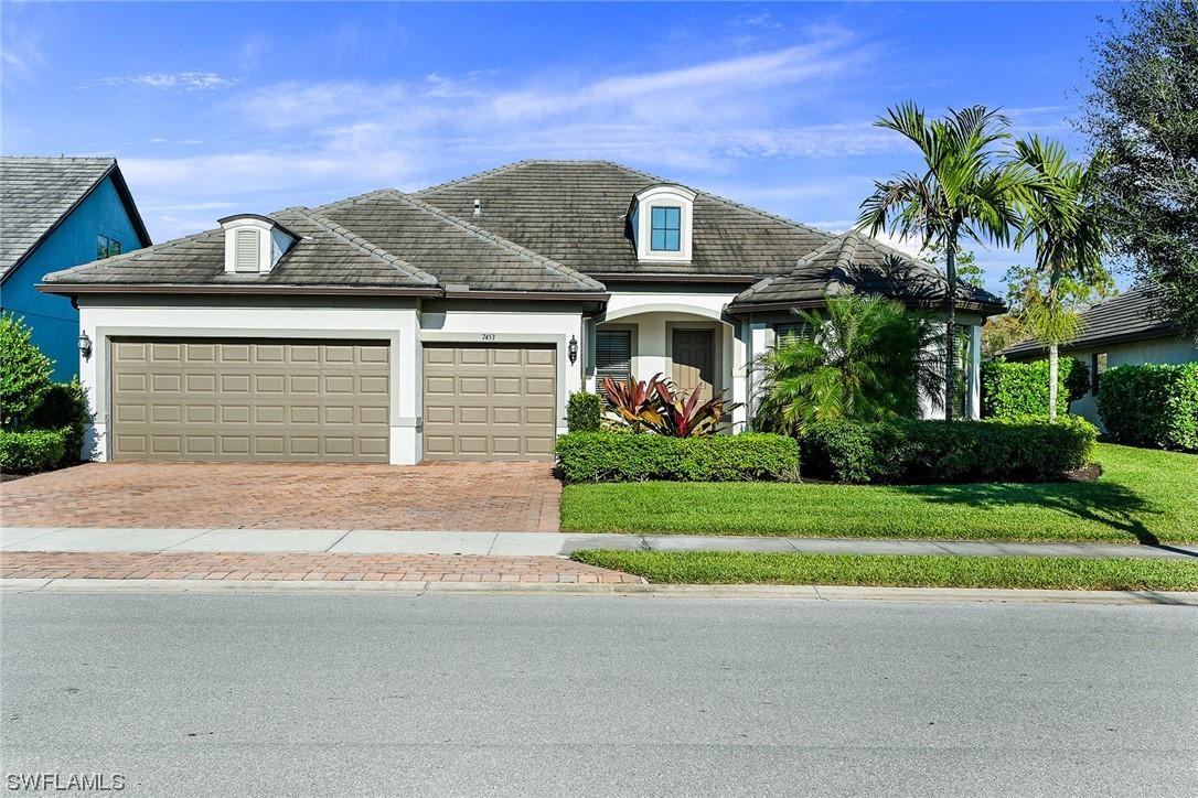7453 Winding Cypress Dr., Naples, FL 34114