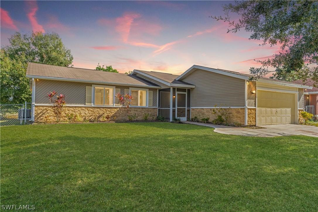 210 Harry Ave., Lehigh Acres, FL 33971