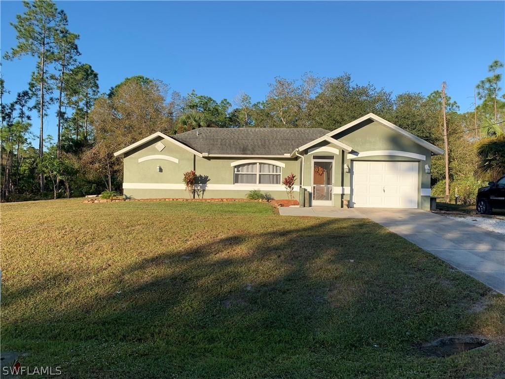703 Moore Ave., Lehigh Acres, FL 33972