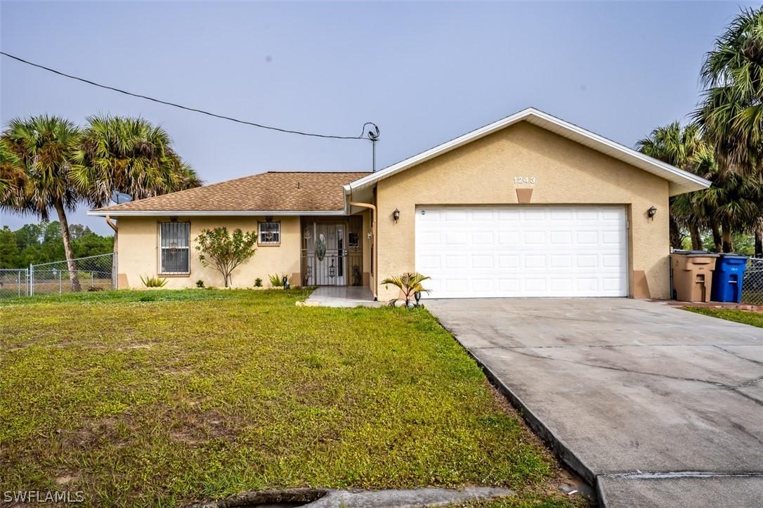 1243 Ermine St., Lehigh Acres, FL 33974