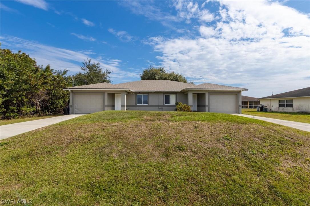 725/727 Ivan Ave., Lehigh Acres, FL 33973