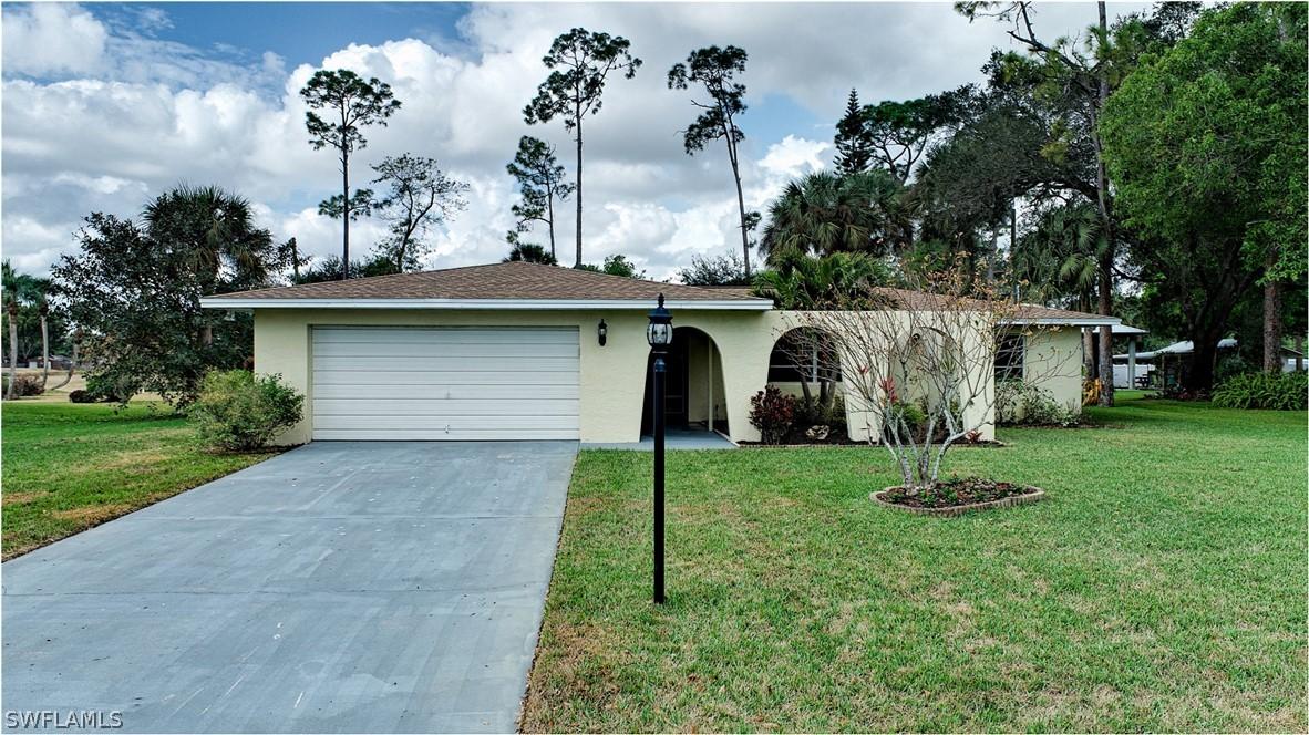 203 Lake Ave., Lehigh Acres, FL 33936