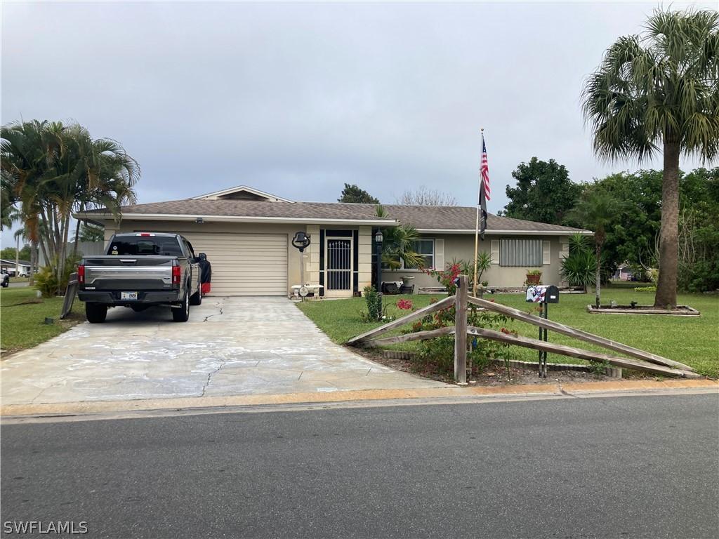 1407 Alwynne Dr., Lehigh Acres, FL 33936