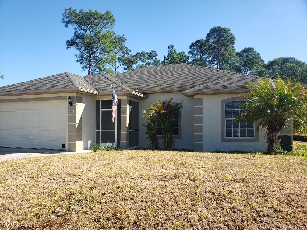 304 Dakota Way, Lehigh Acres, FL 33936