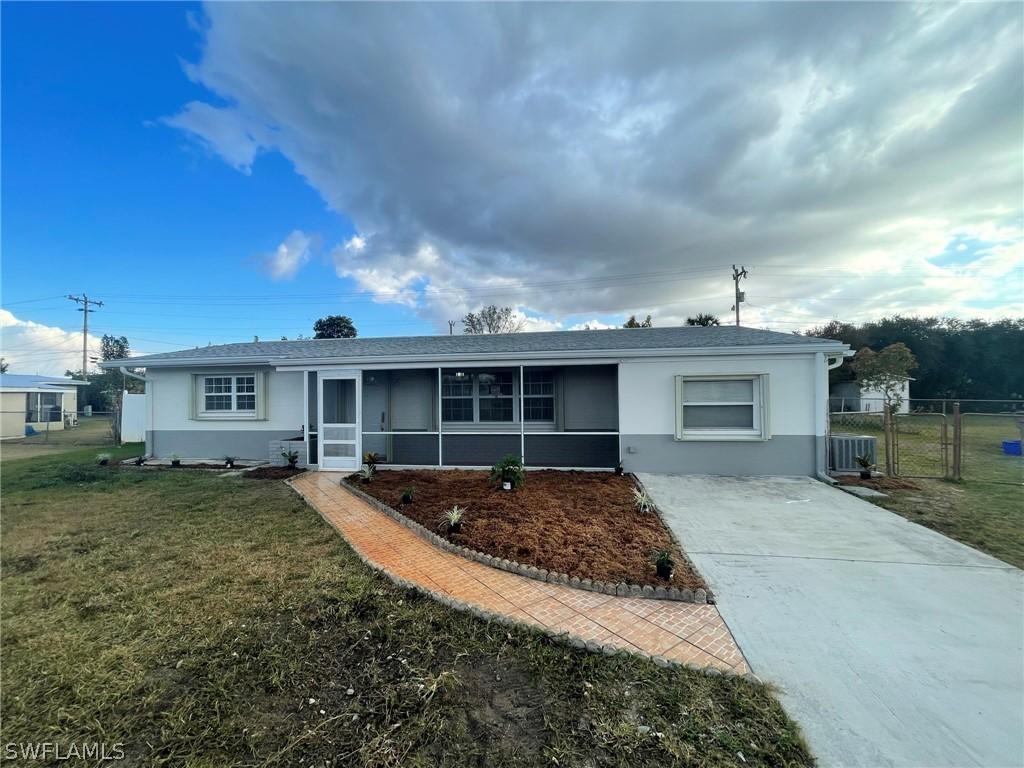 210 Stewart Ln., Lehigh Acres, FL 33936