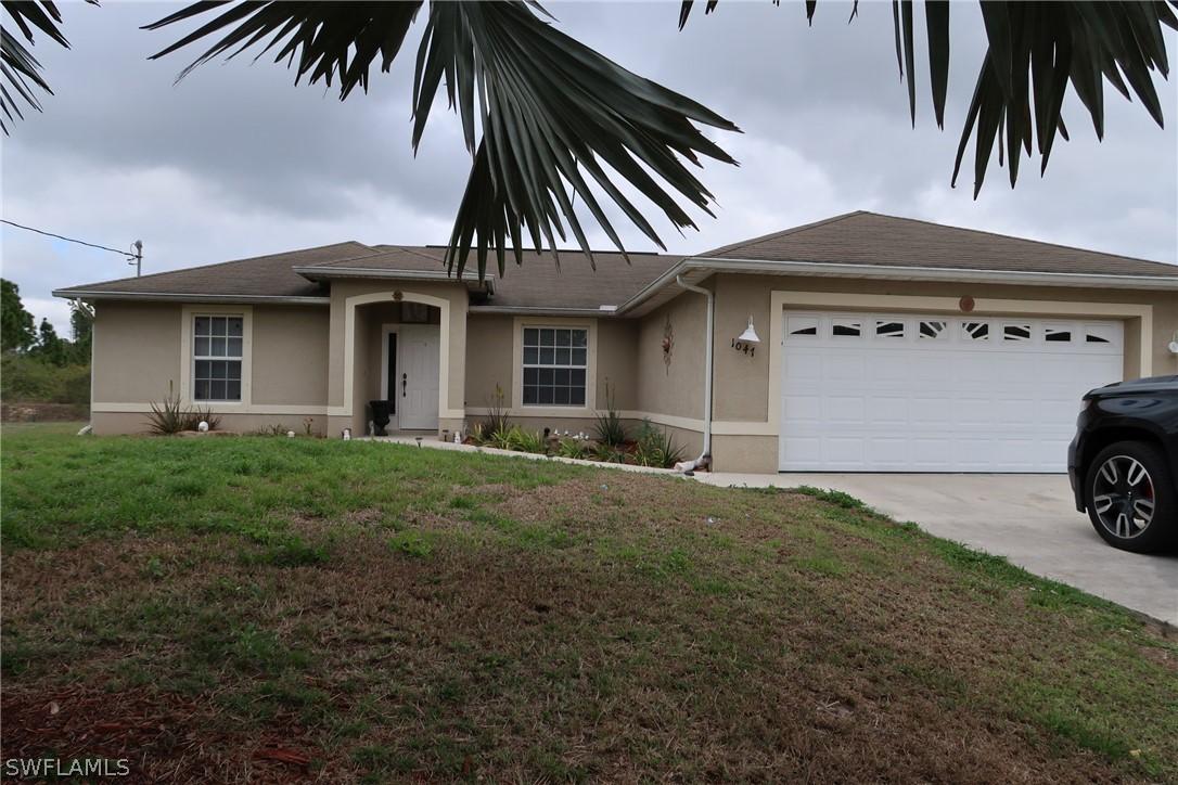 1047 Kellogg St., Lehigh Acres, FL 33974