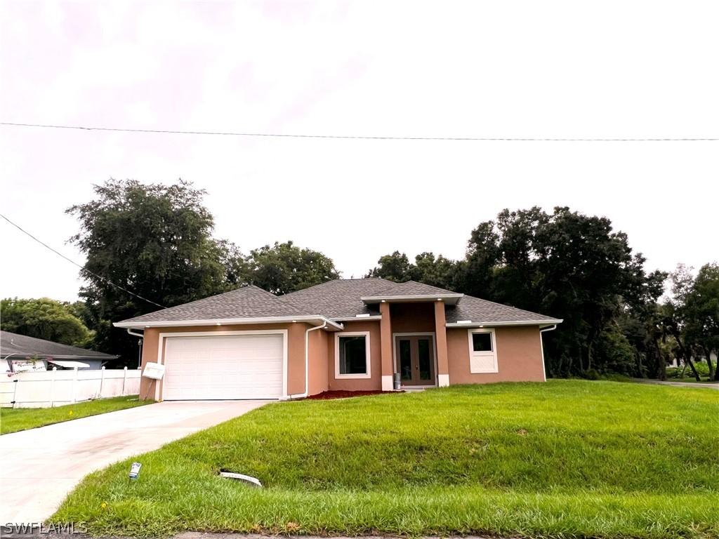 1400 E 4th St., Lehigh Acres, FL 33936