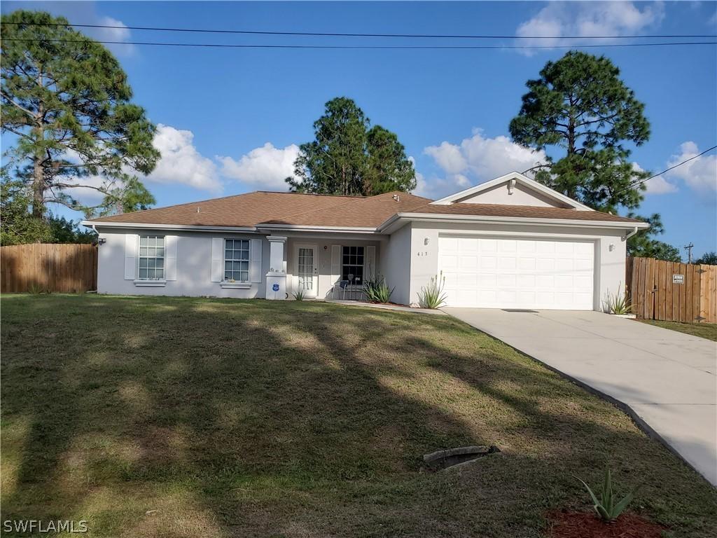 413 Lillon Ave., Lehigh Acres, FL 33974