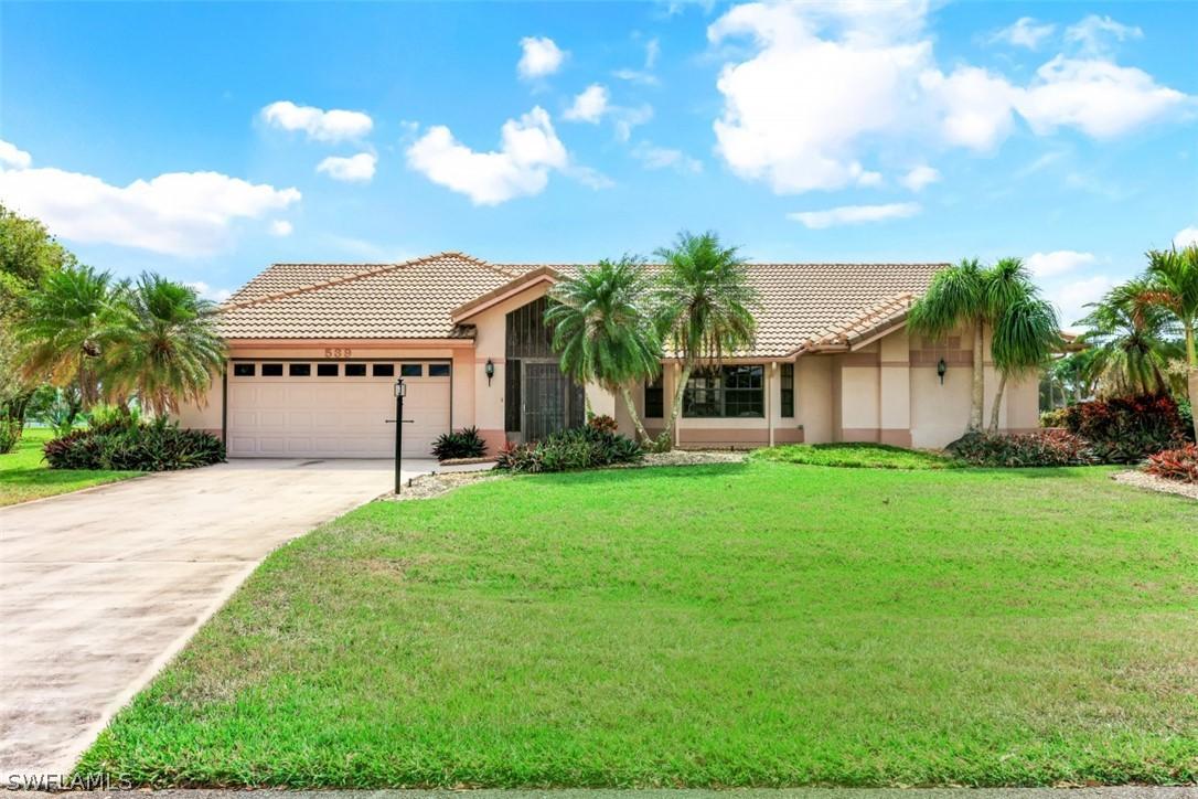 539 Whispering Wind Bend, Lehigh Acres, FL 33974