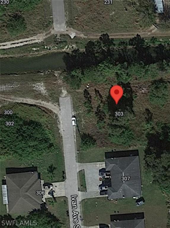 301/303 Ivan Ave., Lehigh Acres, FL 33973