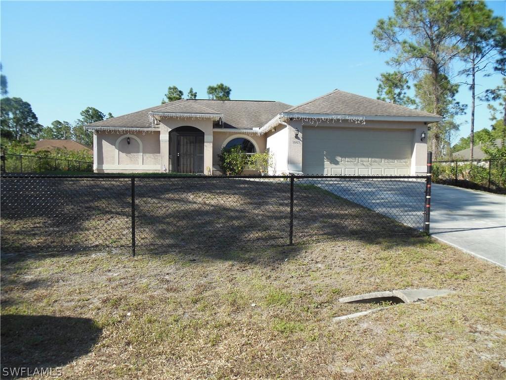 1065 Barnett St., Lehigh Acres, FL 33974