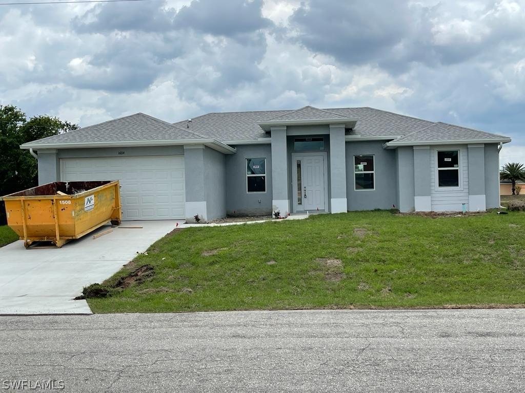 1604 Rita Ave., Lehigh Acres, FL 33971
