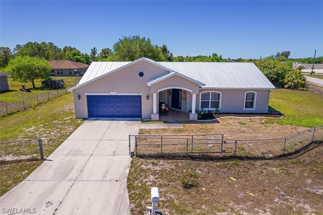 2425 Churchill Ave., Lehigh Acres, FL 33971