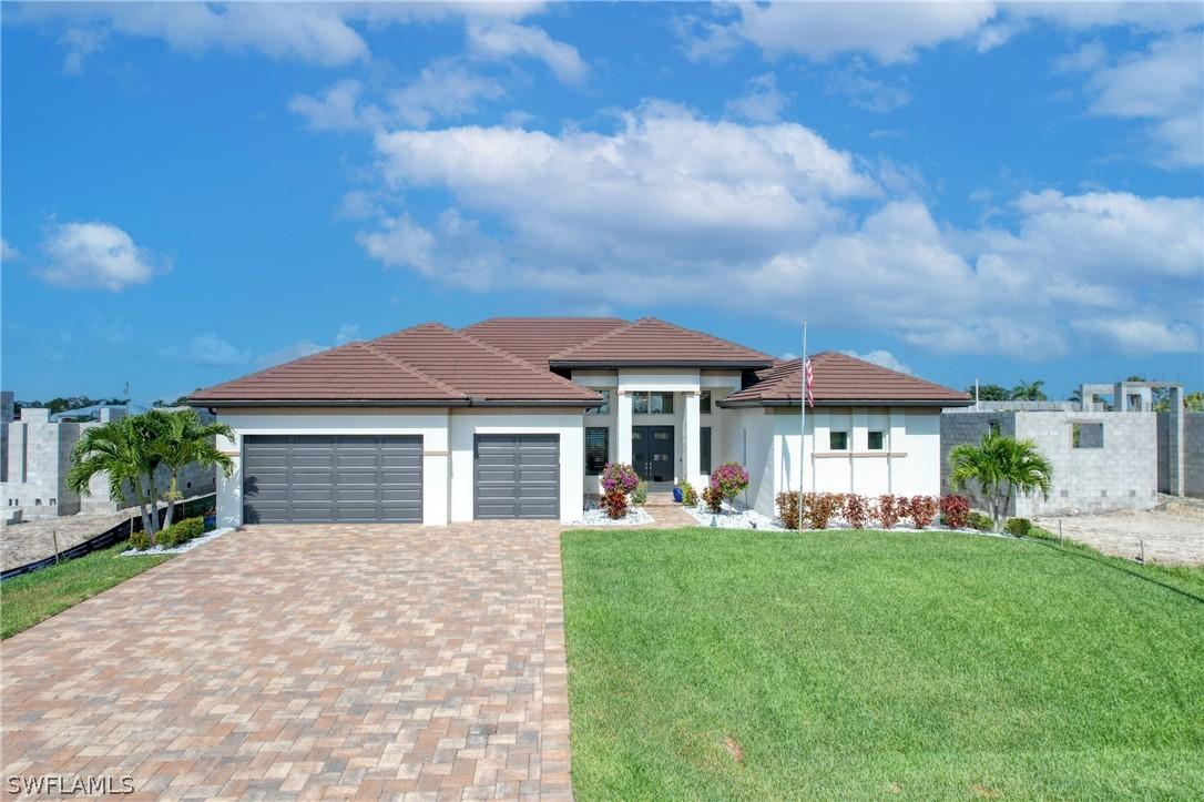 1034 NW 38th Pl., Cape Coral, FL 33993