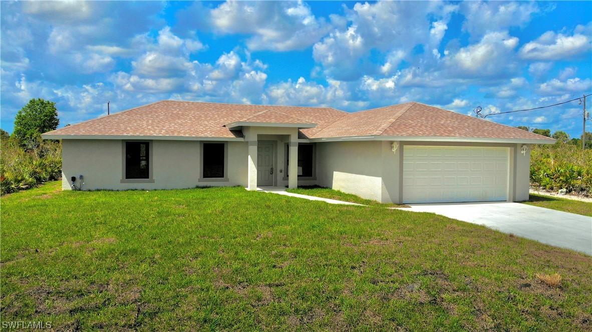 3237 Ruth Ln., Lehigh Acres, FL 33976